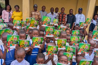 Dr Ita Udosen Extends Support for Governor Pastor Umo Eno’s Education Agenda with Donation of Customised Exercise Books to Two More Schools in Ibesikpo Asutan